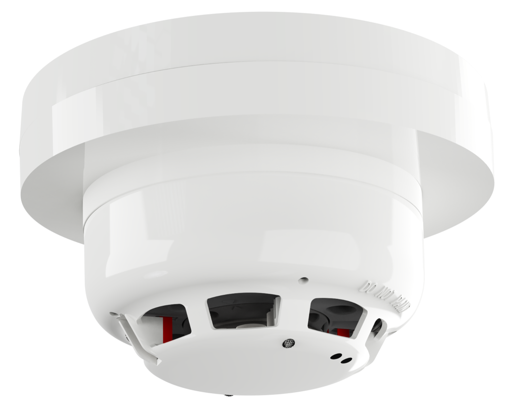 White ceiling smoke detector installed in modern building